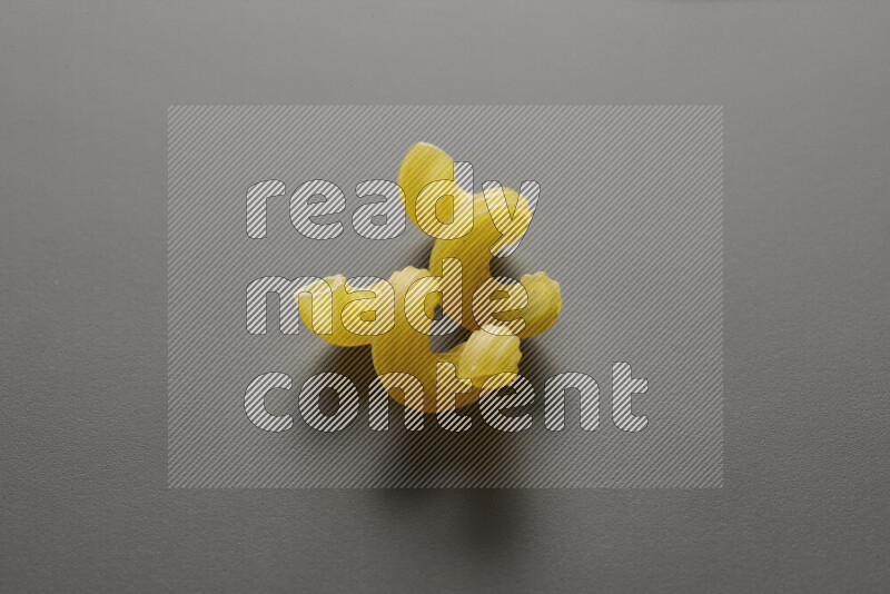 Twist pasta on grey background