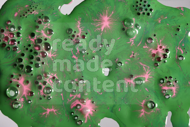 Abstract colorful background with mixed of pink and green paint colors