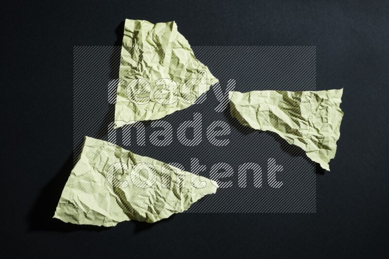 Yellow paper sheet on black background