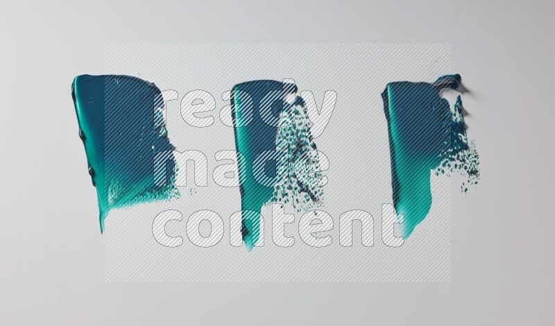 Turquoise painting knife strokes in on white background