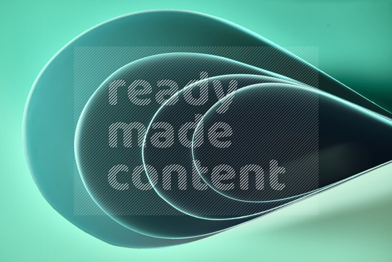 An abstract art of paper folded into smooth curves in green gradients