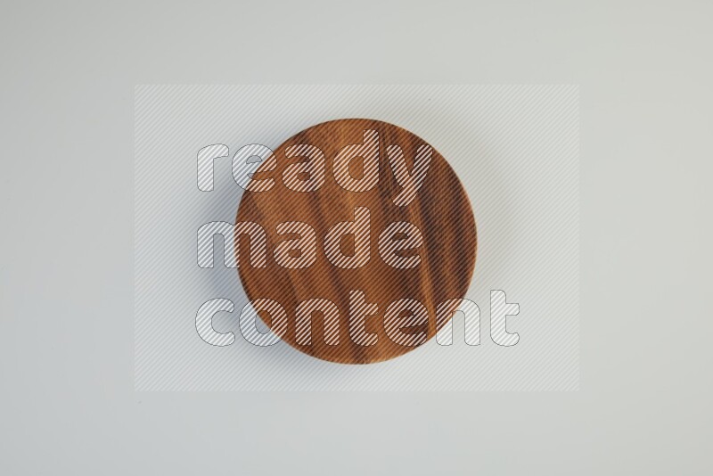 Wooden bowl and plate on white background