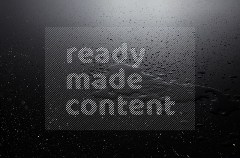 water drops, and droplets on black background