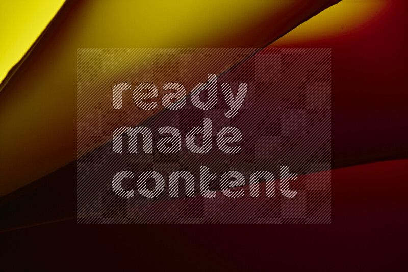 فن تجريدي يعرض منحنيات مع تدرجات الألوان الدافئة والباردة مكونه بضوء ملون