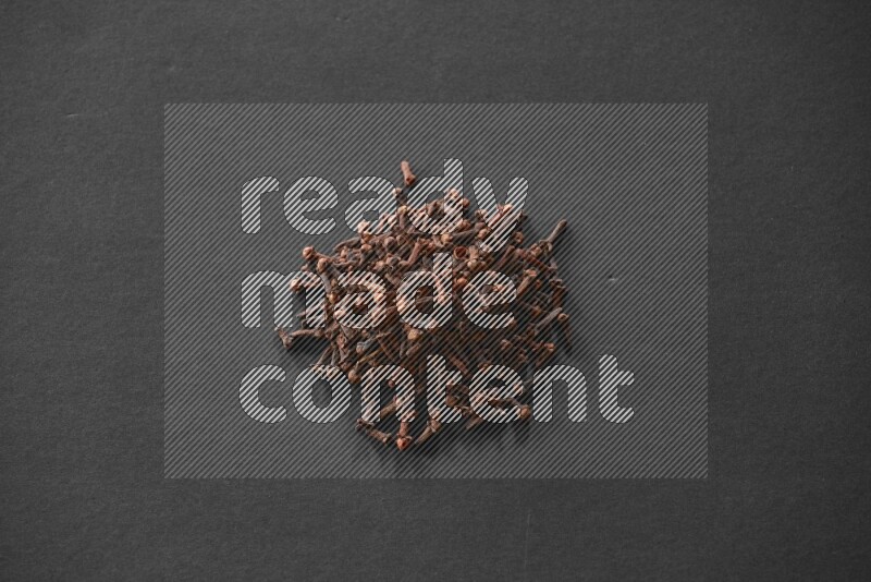 Cloves on a black flooring